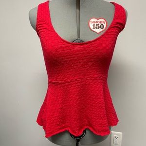 Woman’s red tank top